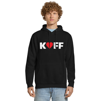 Ein Mann trägt den schwarzen Kaffliebe Männer Hoodie mit der Aufschrift KAFF. Der Buchstabe A ist durch ein rotes Herz ersetzt.