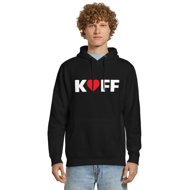 Ein Mann trägt den schwarzen Kaffliebe Männer Hoodie mit der Aufschrift KAFF. Der Buchstabe A ist durch ein rotes Herz ersetzt.